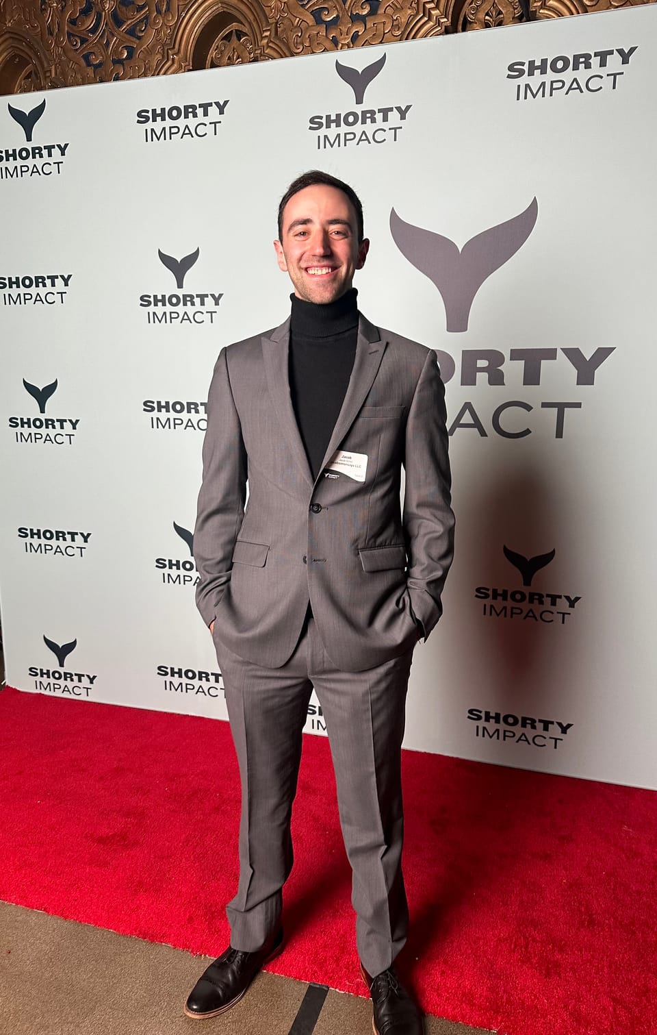 Jacob Simon posing at the Shorty Impact Awards in Los Angeles